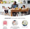 A family is having a meal at a dining table, with a focus on a high chair and its features. Produktbild-Vorschau