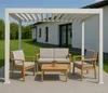 An outdoor lounge set with a sofa, two chairs, and a coffee table under a white pergola, with a house and lawn in the background. Voir les images du produit