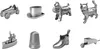 A collection of eight silver-colored Monopoly game tokens arranged in two rows of four against a white background. Produktbild-Vorschau