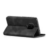 A black flip cover case for a smartphone is shown from the side, propped open. Produktbild-Vorschau