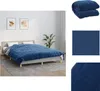 A bedroom scene with a bed and a blue blanket. Náhled obrázku produktu