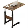 A mobile, height-adjustable bedside table with a laptop, a cup of coffee, and a smartphone on top. Náhled obrázku produktu