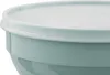 Close-up of the rim and lid of a green storage container. Produktbild-Vorschau