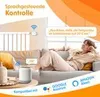 A woman relaxing on a couch while a smart speaker is on a table nearby, with text overlays indicating voice control features. Produktbild-Vorschau