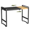 A black and wood-colored expandable microwave shelf with green arrows indicating adjustability. Produktbild-Vorschau