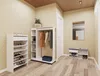 A hallway with furniture for organizing shoes and coats. Produktbild-Vorschau