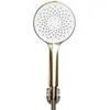 A close-up studio shot of a gold-colored hand shower head. Anteprima dell’immagine prodotto