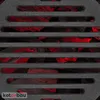 A close-up view of a metal grate with glowing red embers or coals visible underneath. Anteprima dell’immagine prodotto