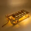 A wooden sled decoration with LED lights. Voir les images du produit