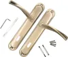 A pair of door handles with their accessories on a white background. Produktbild-Vorschau