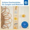 A wooden height chart with animal illustrations and text. Produktbild-Vorschau