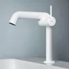 A white faucet is shown on a white sink against a light blue background. Produktbild-Vorschau