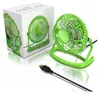 A green USB table fan and its packaging are displayed on a white reflective surface. Anteprima dell’immagine prodotto