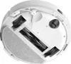 The underside of a white robot vacuum cleaner is shown against a white background. Náhled obrázku produktu