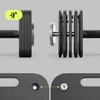 Close-up view of adjustable dumbbells and their components. Produktbild-Vorschau