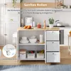 A kitchen island with drawers and shelves in a kitchen setting. Podgląd zdjęcia produktu