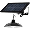 A solar-powered hanging lamp with a solar panel. Anteprima dell’immagine prodotto