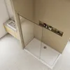A modern bathroom with a sink and a shower enclosure. Produktbild-Vorschau