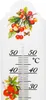 A thermometer with decorative fruit and butterfly imagery. Náhled obrázku produktu