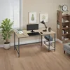 A home office setup with a desk, computer, and bookshelf. Náhled obrázku produktu