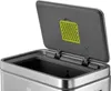 Close-up view of the open lid of a stainless steel trash can. Produktbild-Vorschau