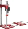 A red and silver drill guide stand with a drill chuck attached. Náhled obrázku produktu