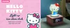 A split image showing marketing text and graphics on the left, and a product shot of a Hello Kitty alarm clock on the right. Podgląd zdjęcia produktu