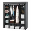 A portable fabric wardrobe with shelves and hanging space, filled with clothing and storage bins. Náhľad obrázku produktu