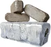 Several peat briquettes are stacked, with some loose and others wrapped in plastic. Produktbild-Vorschau