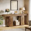 A wooden console table with decorative items in a living room setting. Podgląd zdjęcia produktu