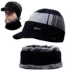 A man wearing a winter hat and scarf set. Produktbild-Vorschau