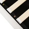 A close-up view of the wooden slats and metal frame of a bed base. Produktbild-Vorschau