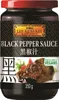 A jar of Lee Kum Kee Black Pepper Sauce with a steak on the label. Voir les images du produit