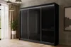A modern bedroom with a large black wardrobe with sliding doors, a plant, and decorative lighting. Produktbild-Vorschau