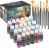 A set of acrylic paints and brushes is displayed against a light gray background. The product packaging is visible in the background, and the paints and brushes are arranged in the foreground. Produktbild-Vorschau