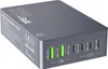 A close-up, angled view of a multi-port GaN charger on a light gray background. Náhľad obrázku produktu