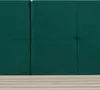 A close-up view of a dark green upholstered headboard with wooden slats visible at the bottom. Produktbild-Vorschau