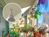 A balcony filled with many potted plants, with a close-up inset showing a hook attached to the ceiling. Náhled obrázku produktu