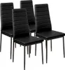 A set of four black dining chairs with metal legs. Náhled obrázku produktu