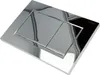 A close-up, angled view of a chrome toilet flush plate. Náhľad obrázku produktu