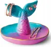 A mermaid tail shaped jewelry dish with rings and bobby pins. Produktbild-Vorschau