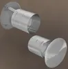 Two metal chimney caps are shown against a brown background. Produktbild-Vorschau