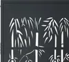 A close-up view of a black metal garden gate with a cut-out bamboo design. Náhľad obrázku produktu