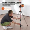 A man is adjusting a laser level tripod indoors. Anteprima dell’immagine prodotto