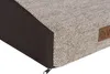A close-up view of a corner of a pet stair, showing the textured fabric and a small leather tag with a logo. Produktbild-Vorschau
