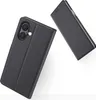 A black flip case for a smartphone is shown against a white background. Another part of the case is shown in the upper right corner. Produktbild-Vorschau