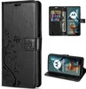 A collage of images showing a black flip phone case with floral and butterfly embossing, and a Motorola phone inside a similar case. Produktbild-Vorschau