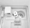 The image shows the interior of a humidifier, specifically the water tank area with a filter and a water cube component. Náhľad obrázku produktu