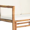 A close-up view of a bamboo sofa armrest and cushion. Náhled obrázku produktu