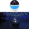 A star projector night light is shown in two different settings: one on a white background and another in a darkened room projecting stars onto the ceiling. Anteprima dell’immagine prodotto